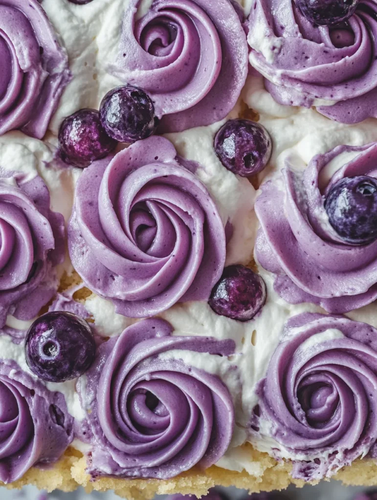 Overhead view of completed blueberry poke cake