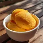 Homemade 5-minute mango sorbet served in regular glass bowls for family dinner